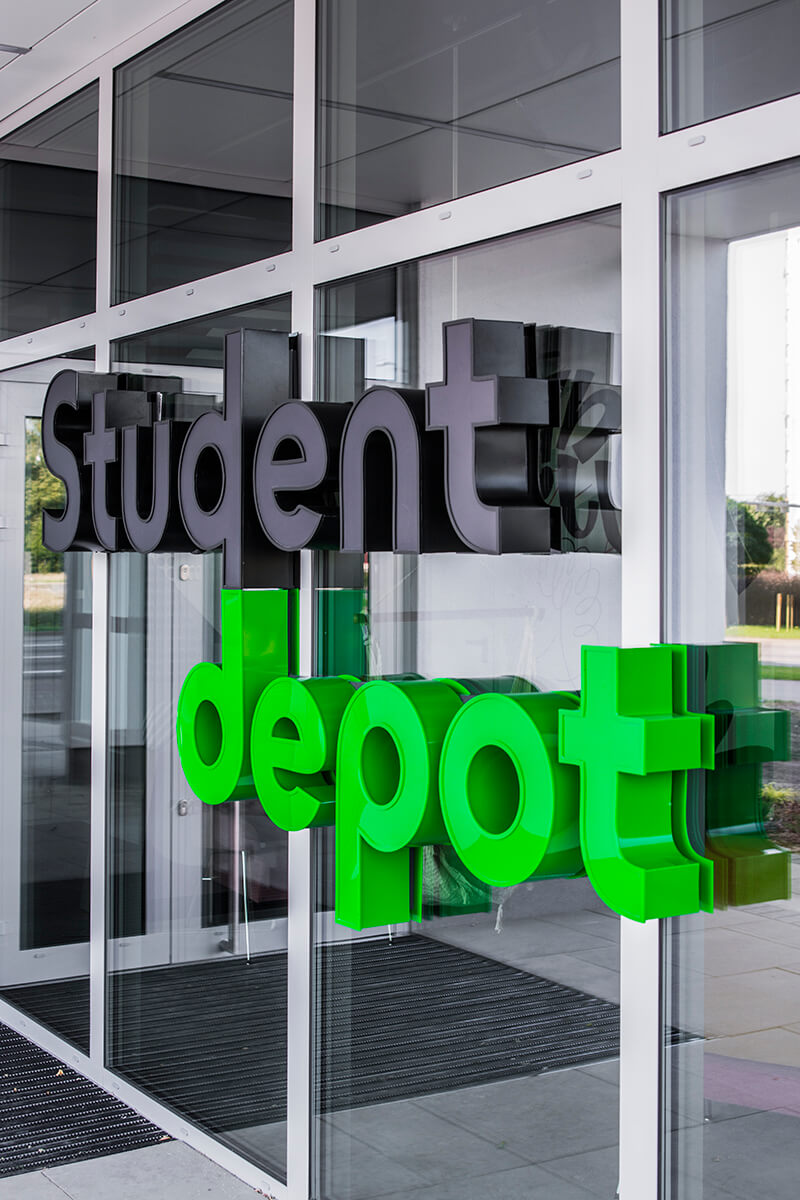 student depot - student-depot-spatial-lettering-lettering-at-the-entry-lettering-at-the-window-lettering-at-the-pelasium-green-lettering-at-the-ordering-logo-firm-lettering-at-height-eye-lettering-with-plexi-gdansk-przymorze
